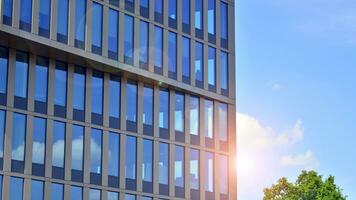 Modern building.Modern office building with facade of glass photo