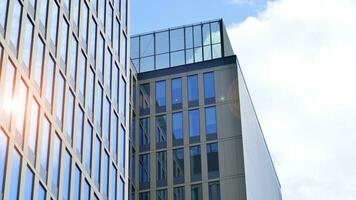 Modern building.Modern office building with facade of glass photo