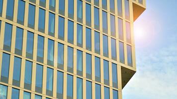 Modern building.Modern office building with facade of glass photo