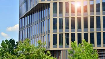 Modern building.Modern office building with facade of glass photo