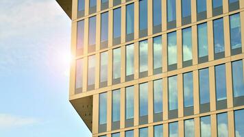 Modern building.Modern office building with facade of glass photo