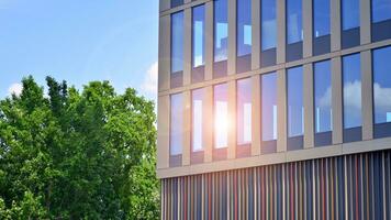 Modern building.Modern office building with facade of glass photo