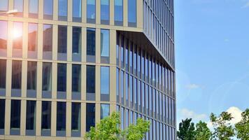 Modern building.Modern office building with facade of glass photo
