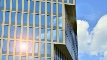 Modern building.Modern office building with facade of glass photo