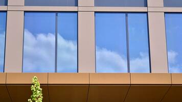 Modern building.Modern office building with facade of glass photo