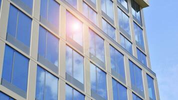 Modern building.Modern office building with facade of glass photo