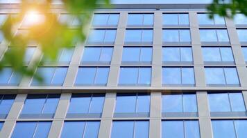 Modern building.Modern office building with facade of glass photo
