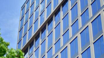 Modern building.Modern office building with facade of glass photo