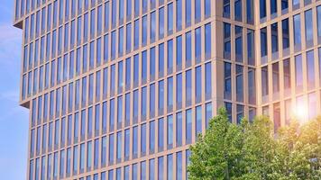 Modern building.Modern office building with facade of glass photo