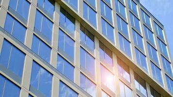 Modern building.Modern office building with facade of glass photo