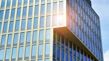 Modern building.Modern office building with facade of glass photo