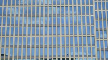 Modern building.Modern office building with facade of glass photo