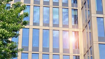 Modern building.Modern office building with facade of glass photo