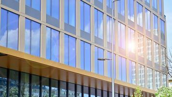 Modern building.Modern office building with facade of glass photo