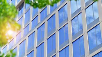 Modern building.Modern office building with facade of glass photo