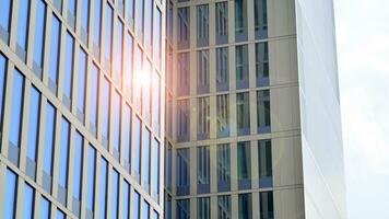 Modern building.Modern office building with facade of glass photo