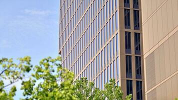 Modern building.Modern office building with facade of glass photo