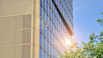 Modern building.Modern office building with facade of glass photo