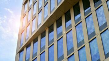 Modern building.Modern office building with facade of glass photo