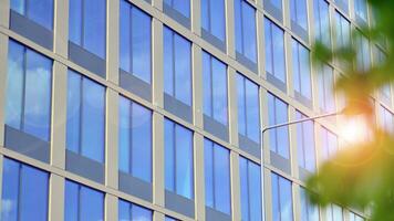 Modern building.Modern office building with facade of glass photo
