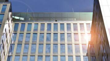 Modern building.Modern office building with facade of glass photo