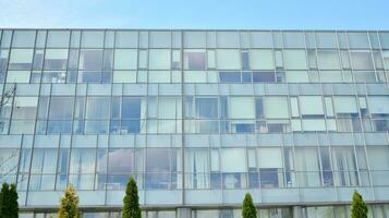 Modern building.Modern office building with facade of glass photo