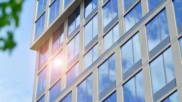 Modern building.Modern office building with facade of glass photo