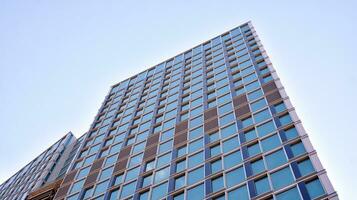 Modern building.Modern office building with facade of glass photo