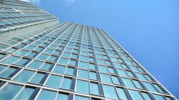 Modern building.Modern office building with facade of glass photo