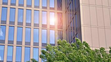Modern building.Modern office building with facade of glass photo