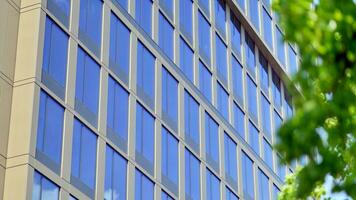 Modern building.Modern office building with facade of glass photo