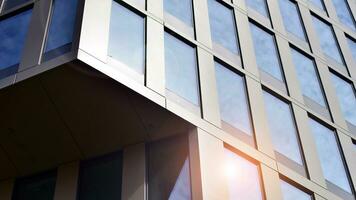 Modern building.Modern office building with facade of glass photo