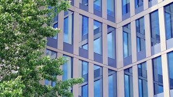 Modern building.Modern office building with facade of glass photo