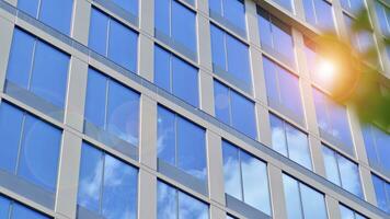 Modern building.Modern office building with facade of glass photo