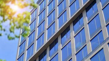 Modern building.Modern office building with facade of glass photo