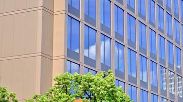 Modern building.Modern office building with facade of glass photo