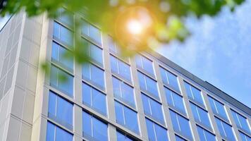 Modern building.Modern office building with facade of glass photo
