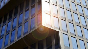 Modern building.Modern office building with facade of glass photo
