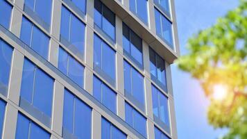 Modern building.Modern office building with facade of glass photo