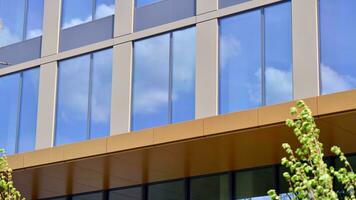 Modern building.Modern office building with facade of glass photo