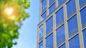 Modern building.Modern office building with facade of glass photo