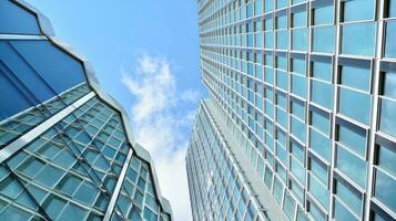 Modern building.Modern office building with facade of glass photo