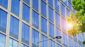 Modern building.Modern office building with facade of glass photo