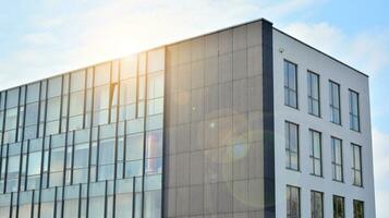 Modern building.Modern office building with facade of glass photo