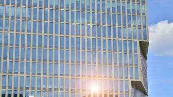 Modern building.Modern office building with facade of glass photo
