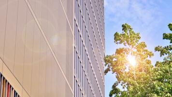 Modern building.Modern office building with facade of glass photo