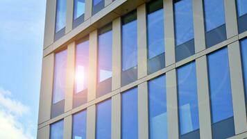 Modern building.Modern office building with facade of glass photo