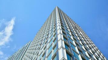 Modern building.Modern office building with facade of glass photo