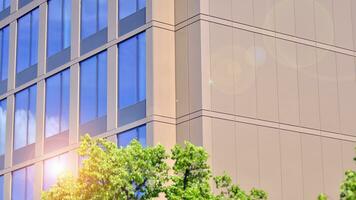 Modern building.Modern office building with facade of glass photo