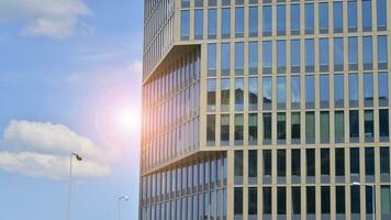 Modern building.Modern office building with facade of glass photo